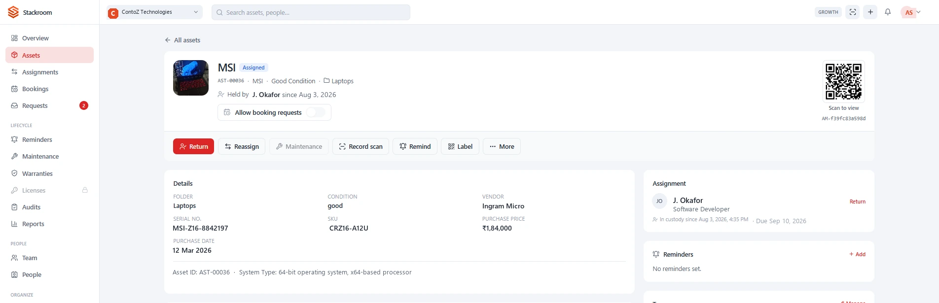 StackRoom asset record showing who currently holds the asset, with return, reassign, record scan and label actions